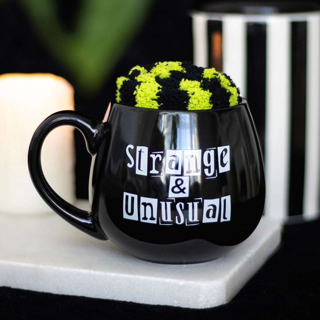 STRANGE & UNUSUAL MUG AND SOCKS SET