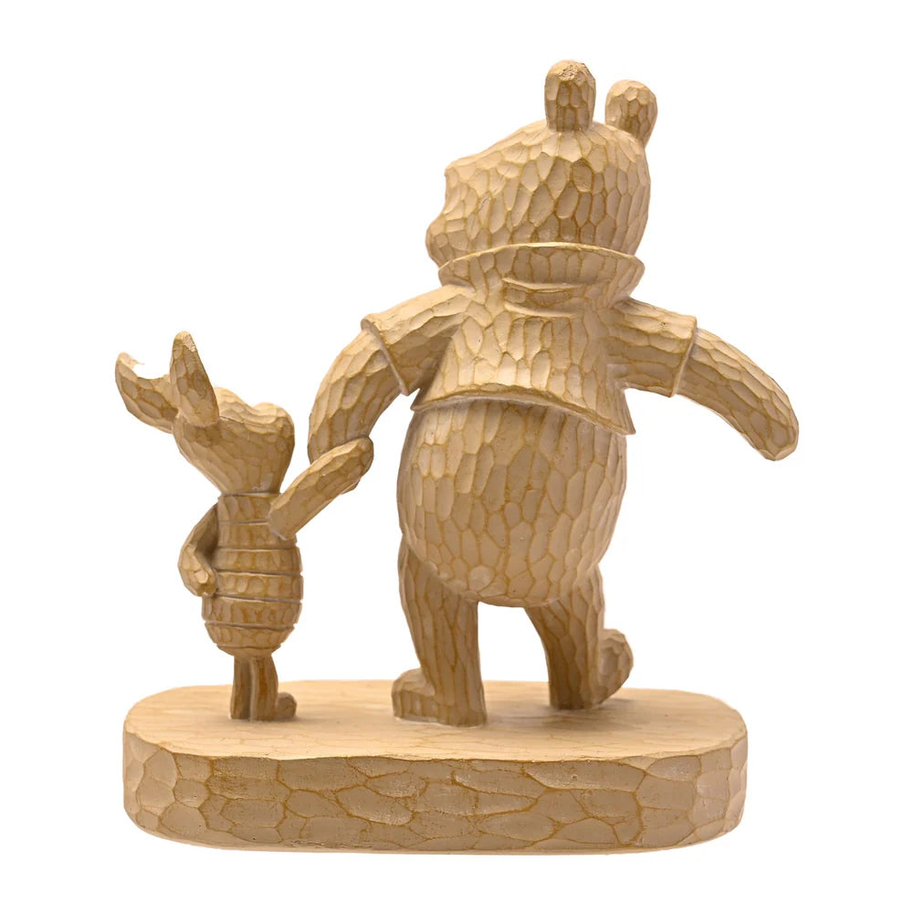 DISNEY WINNIE THE POOH WOOD EFFECT RESIN FIGURINE 'THE TINY PITTER PATTER OF FEET"