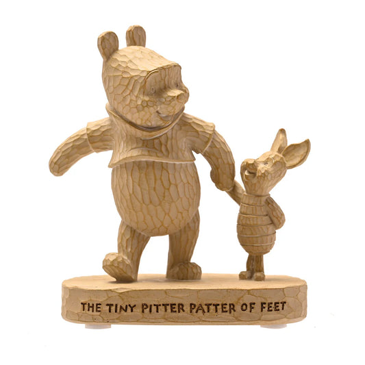 DISNEY WINNIE THE POOH WOOD EFFECT RESIN FIGURINE 'THE TINY PITTER PATTER OF FEET"